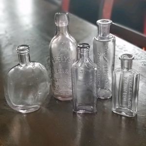 Lot of purple apothecary vintage bottles